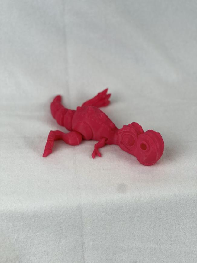 "Articulated T-Rex Toy | Durable PLA+ Material | ASMR Rattle Feature | Bobble Head, Wiggling Tail, and Moving Legs | Chibi-Style Design